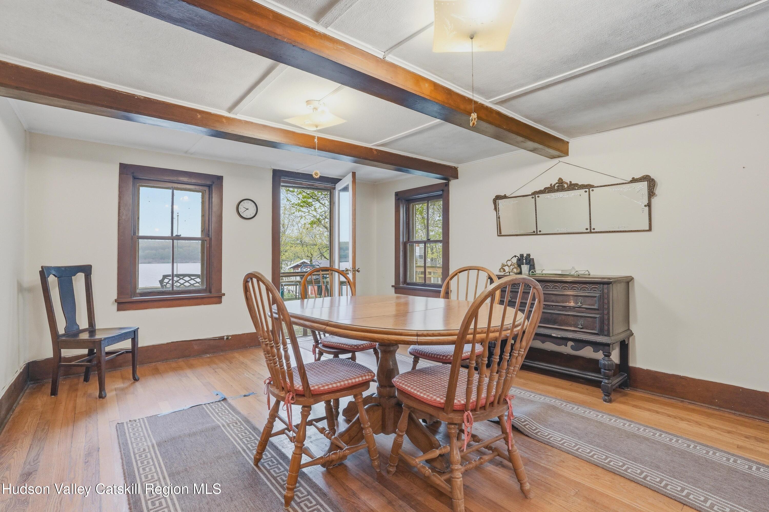 167 Patterson Road West Camp, NY 12490 - Photo 13 of 43 a dining room with furniture and wooden floor