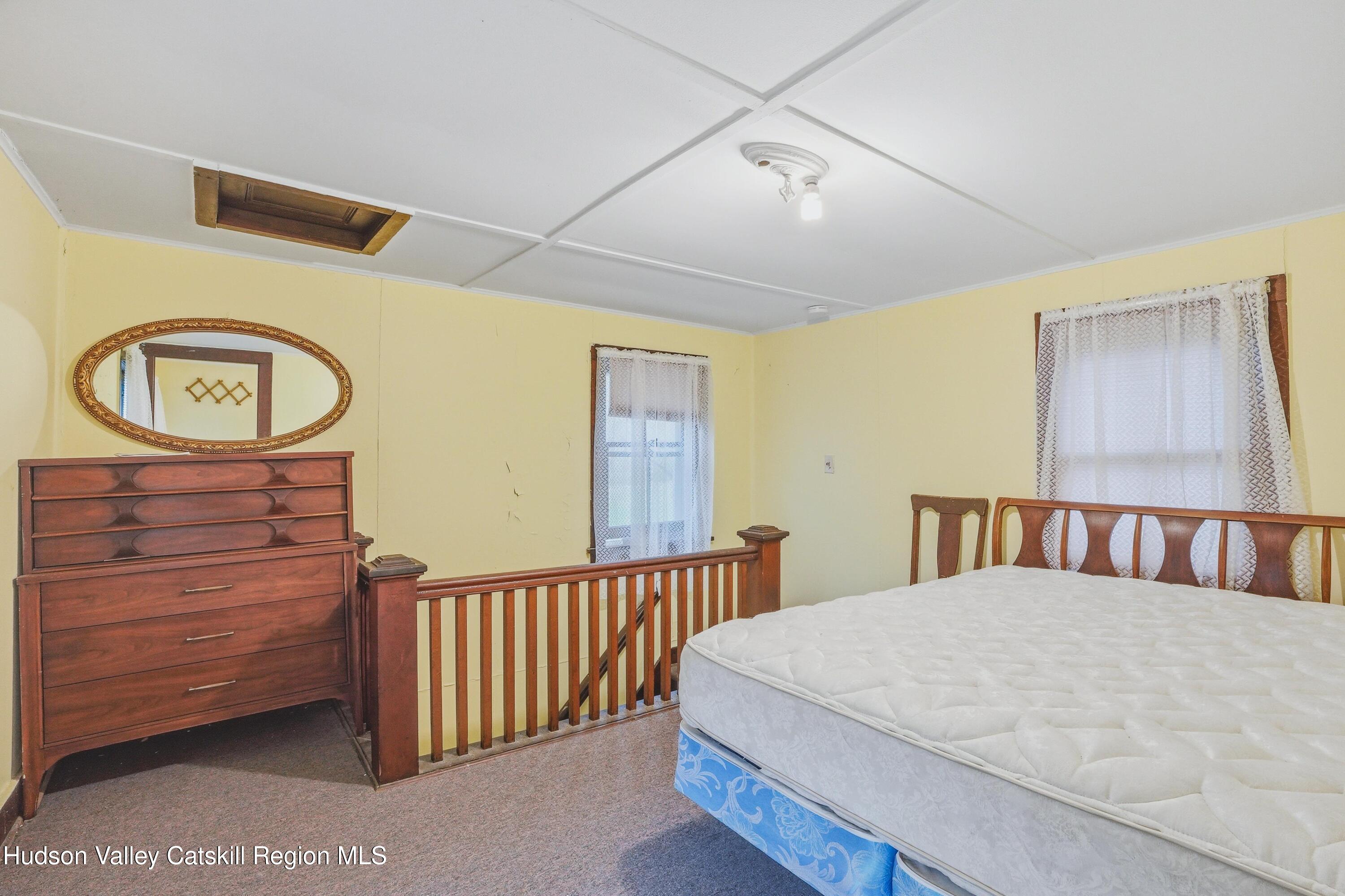 167 Patterson Road West Camp, NY 12490 - Photo 21 of 43 a bedroom with a bed and a window
