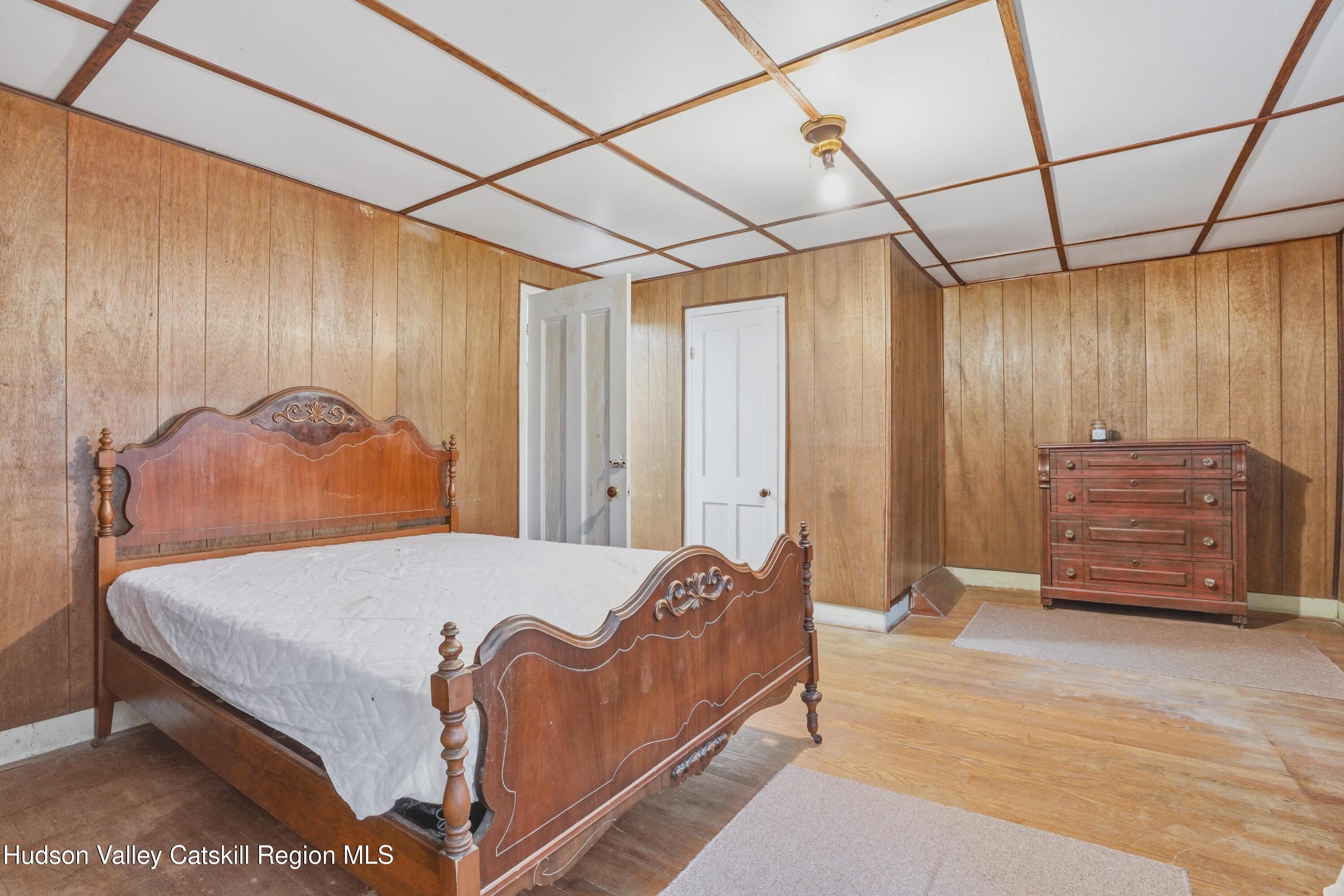 167 Patterson Road West Camp, NY 12490 - Photo 24 of 43 a bedroom with a bed and a dresser