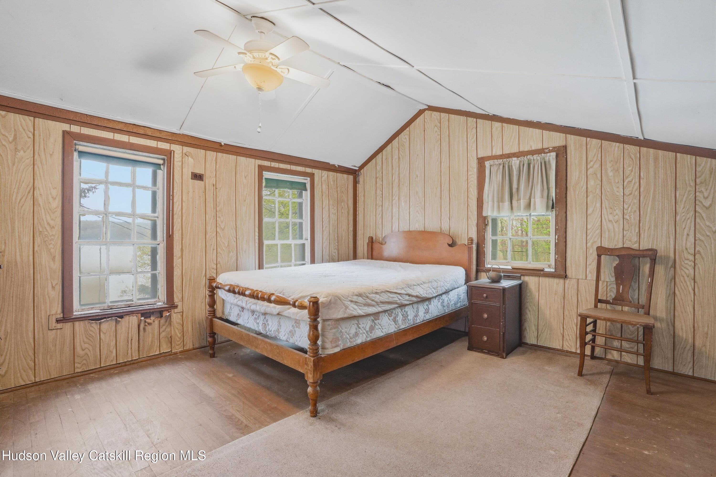 167 Patterson Road West Camp, NY 12490 - Photo 26 of 43 a bed sitting in a spacious bedroom next to a window