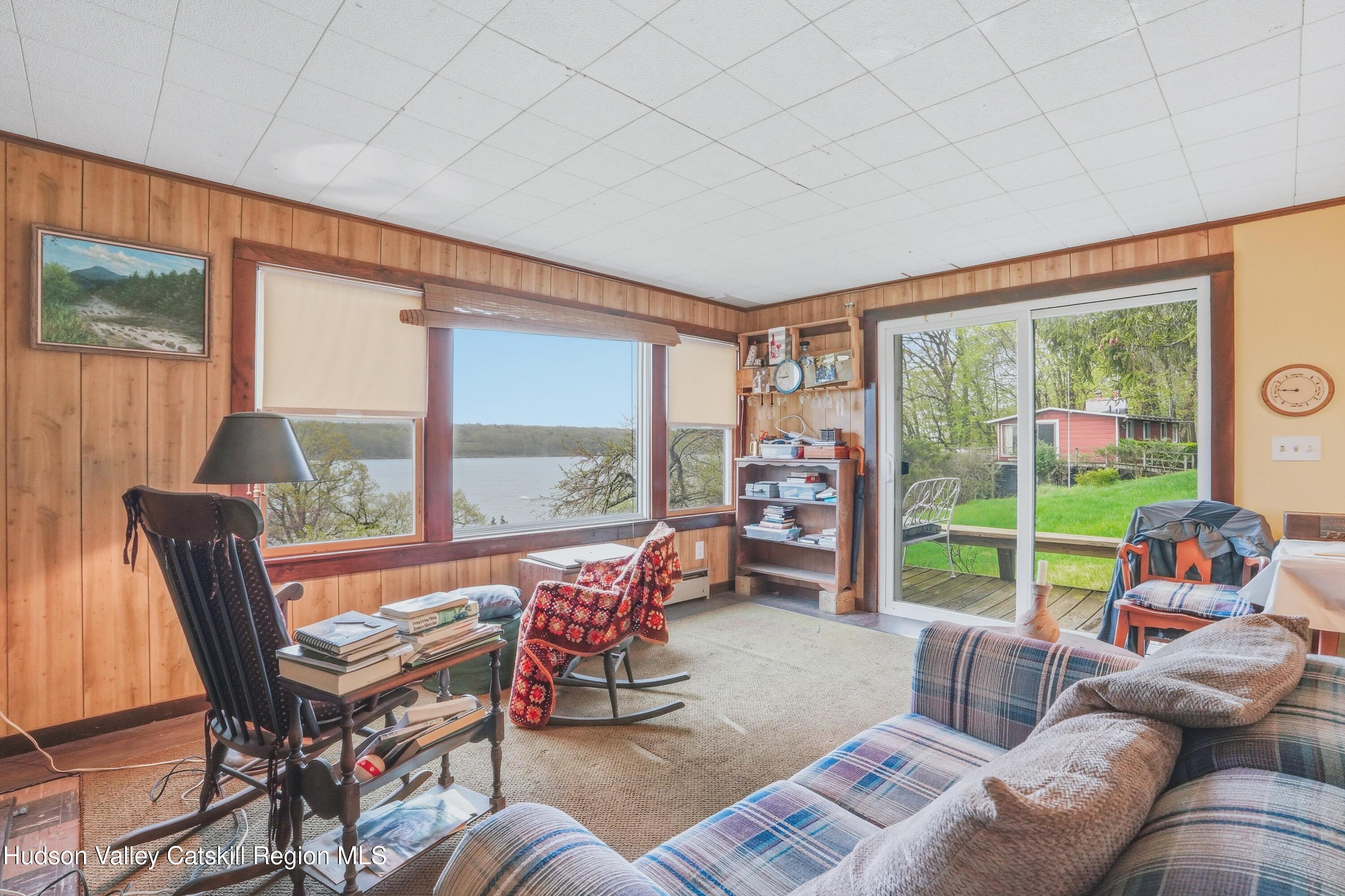 167 Patterson Road West Camp, NY 12490 - Photo 33 of 43 a living room with furniture and a large window