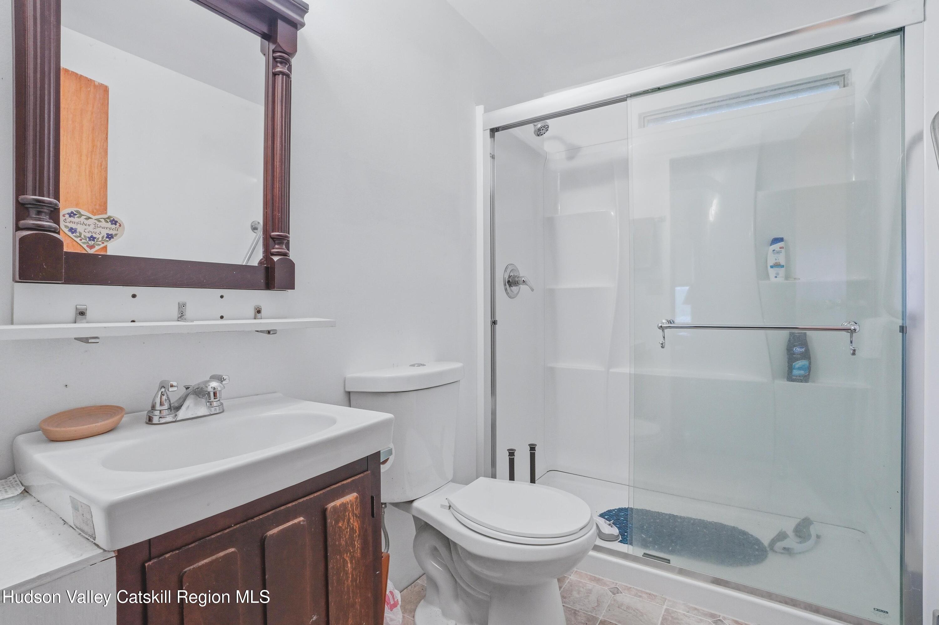 167 Patterson Road West Camp, NY 12490 - Photo 34 of 43 a bathroom with a sink toilet and shower