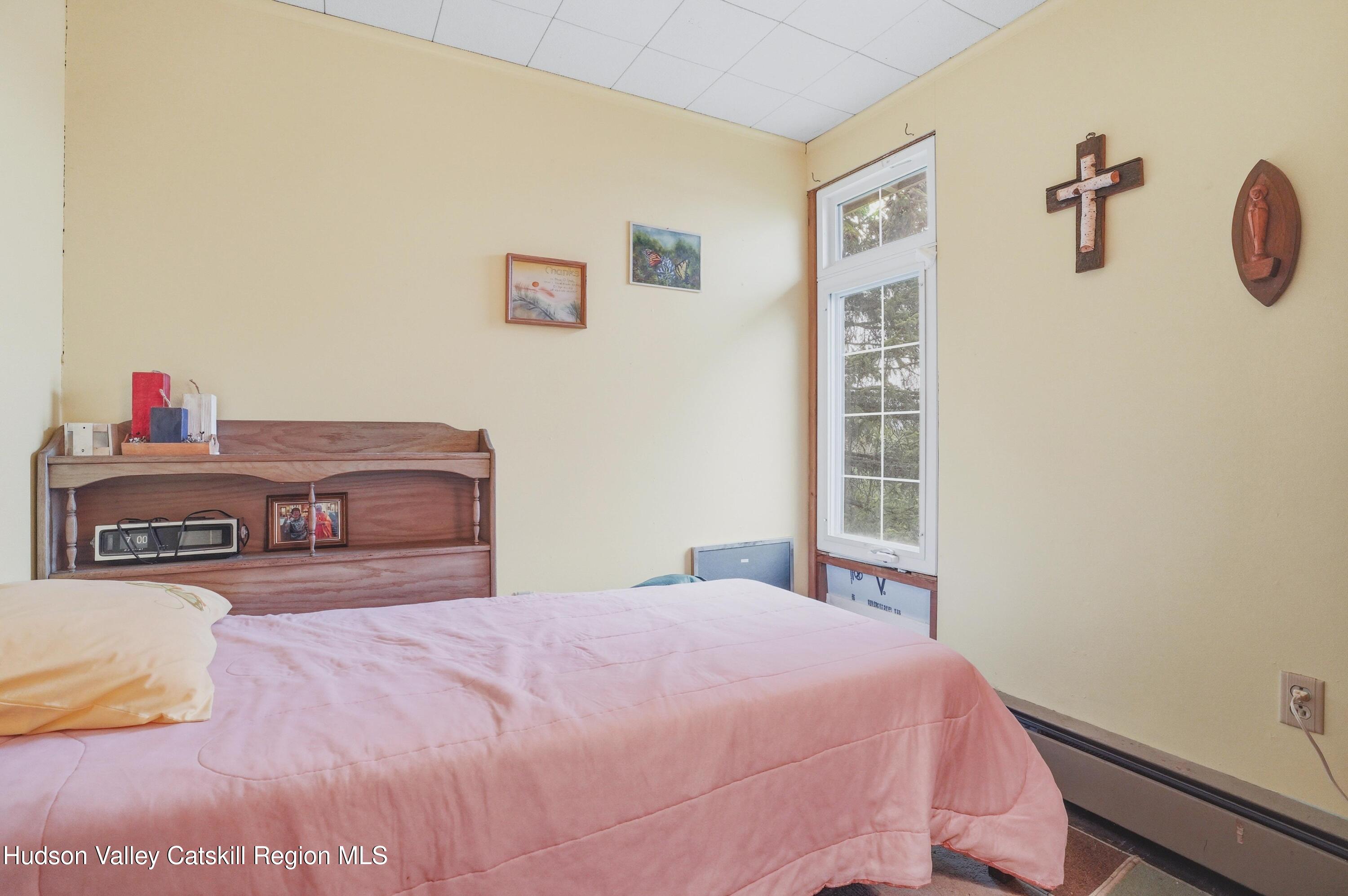 167 Patterson Road West Camp, NY 12490 - Photo 36 of 43 a bedroom with a bed and dresser