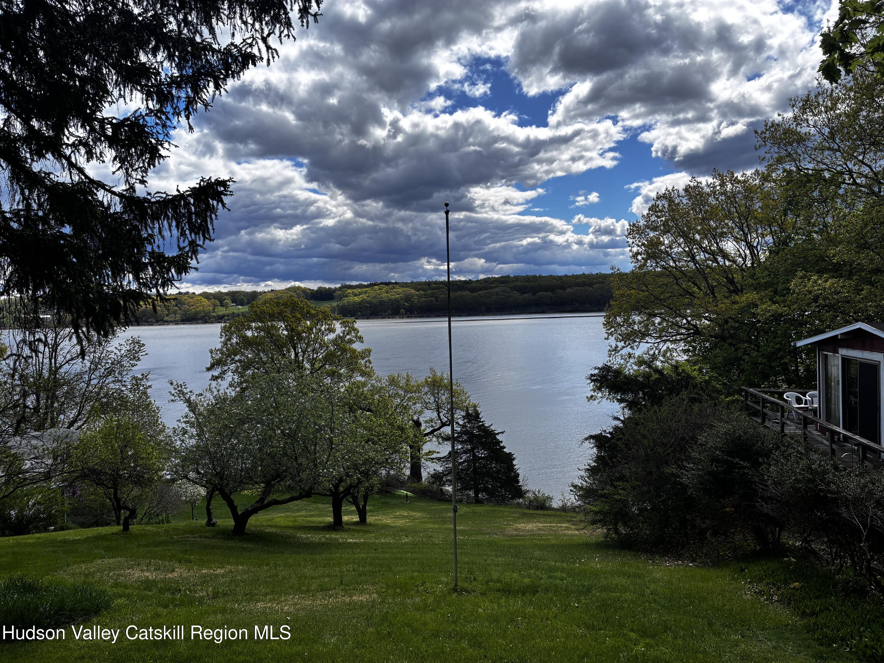 167 Patterson Road West Camp, NY 12490 - Photo 43 of 43 a view of a lake with a garden