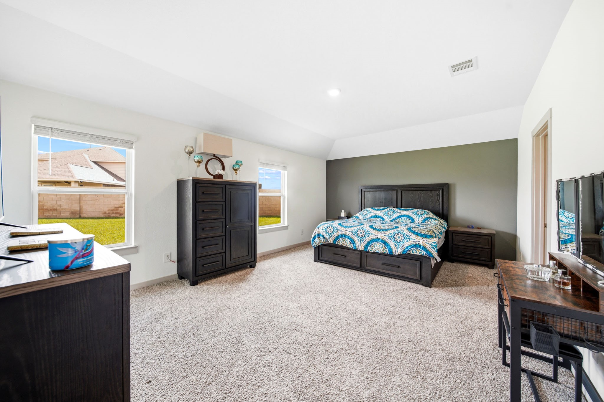 10207 Alpine Lake Lane Rosharon, TX 77583 - Photo 13 of 30 a bedroom with a bed and a television