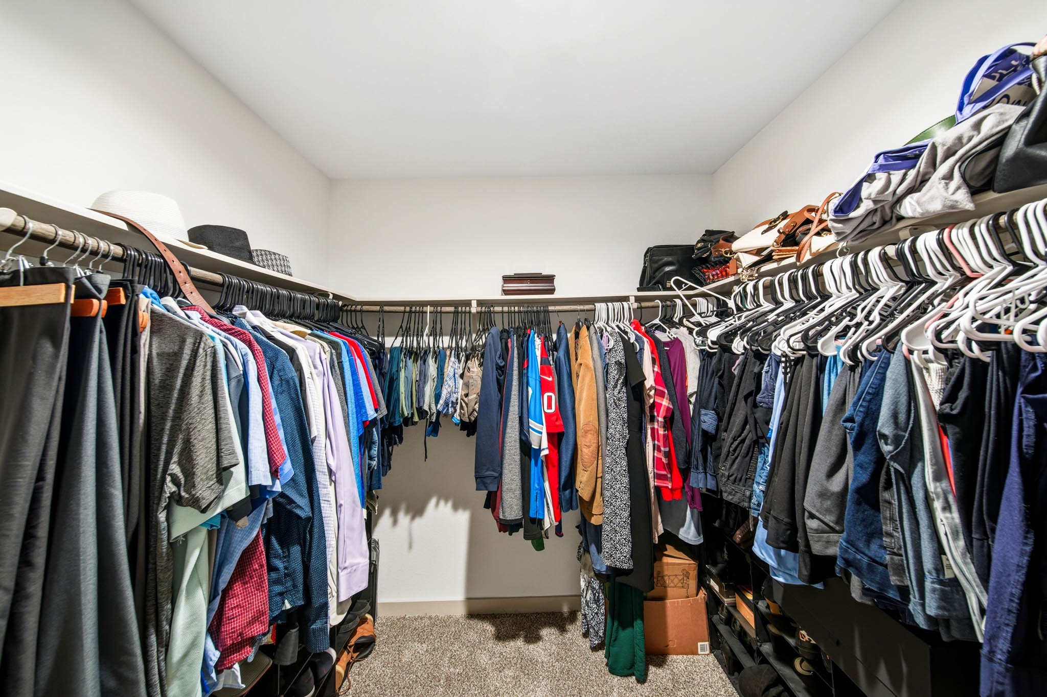 10207 Alpine Lake Lane Rosharon, TX 77583 - Photo 18 of 30 a view of walk in closet with clothes