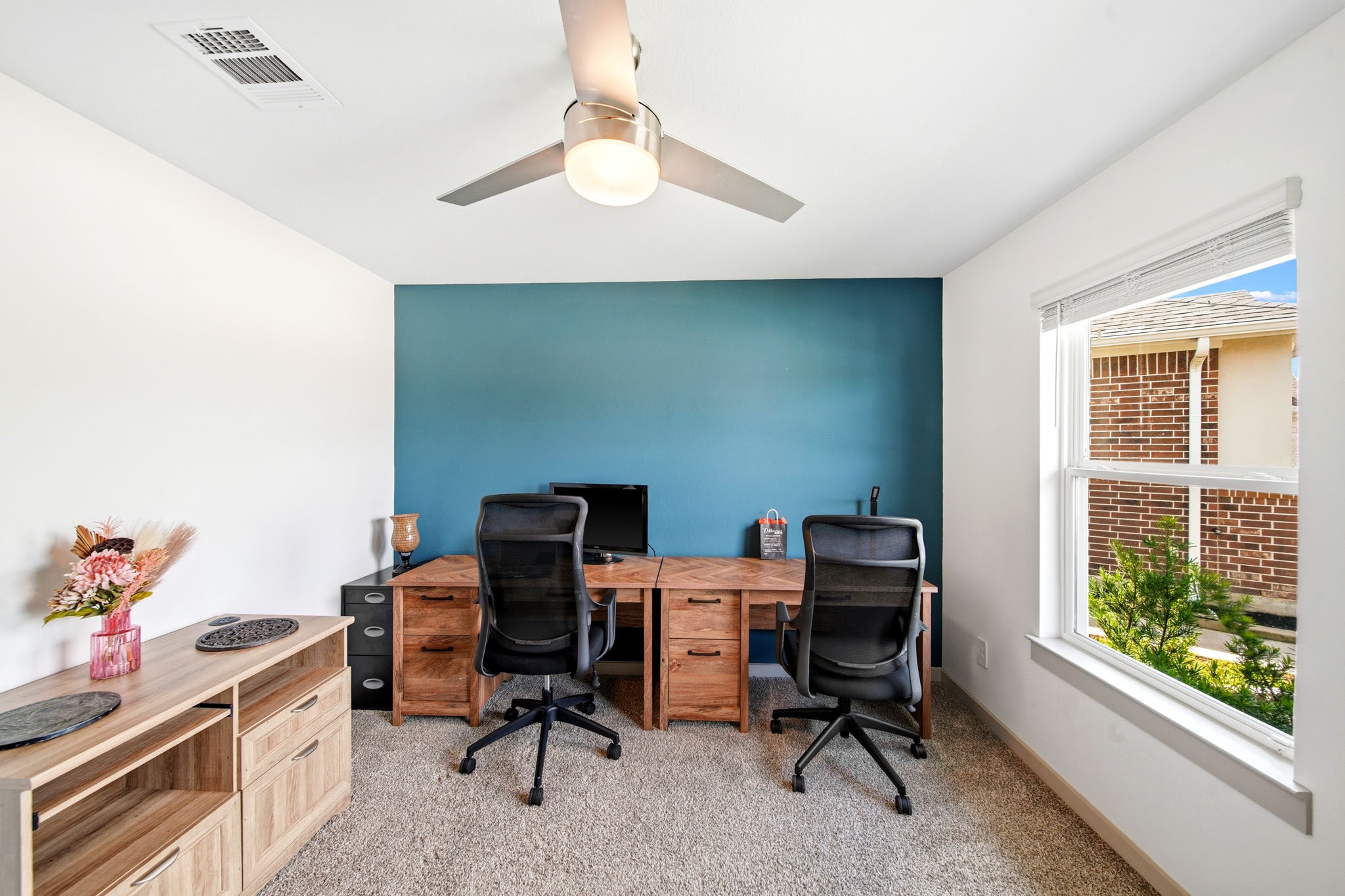 10207 Alpine Lake Lane Rosharon, TX 77583 - Photo 21 of 30 a view of a workspace with furniture and a window