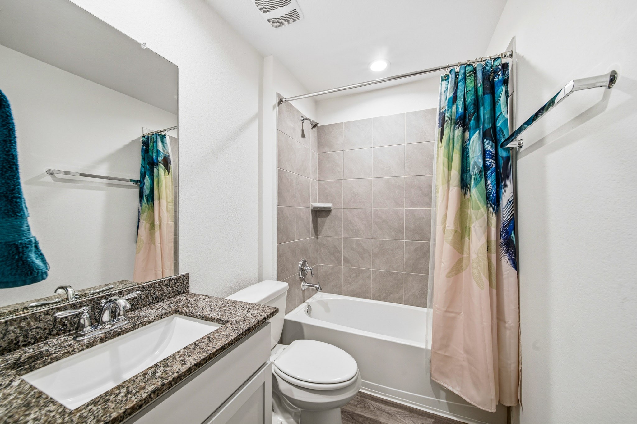 10207 Alpine Lake Lane Rosharon, TX 77583 - Photo 23 of 30 a bathroom with a granite countertop sink toilet and shower