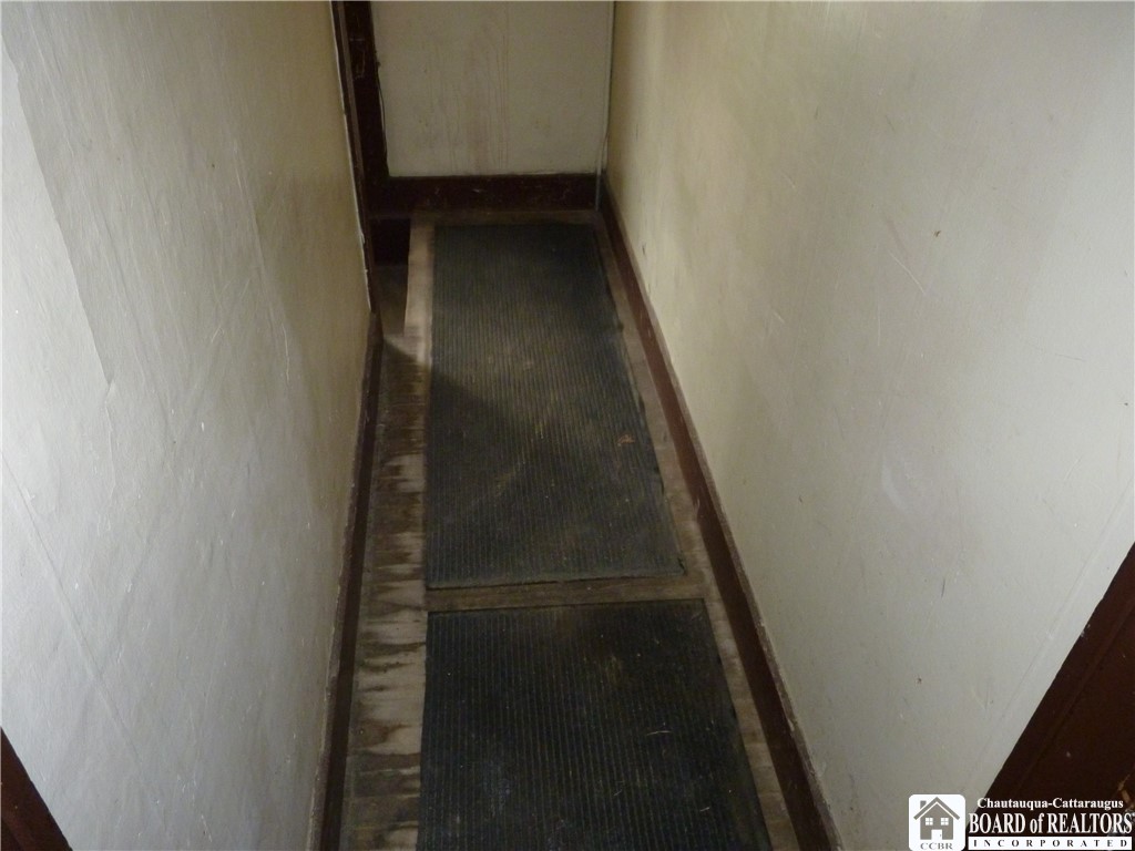 70 Pershing Avenue Jamestown, NY 14701 - Photo 30 of 34 Hallway from sidedoor to stairway to upper unit