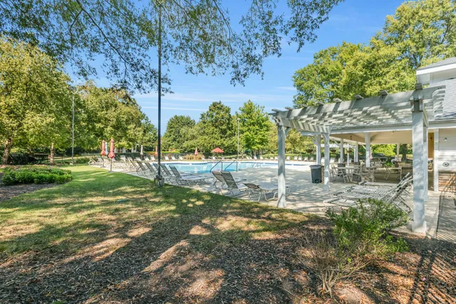 a backyard of a house with lots of green space