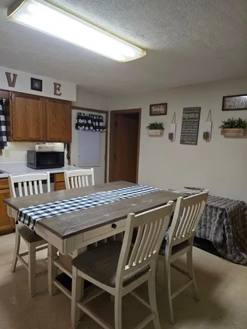 a view of a dining room with furniture