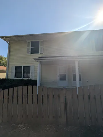 a front view of a house with balcony