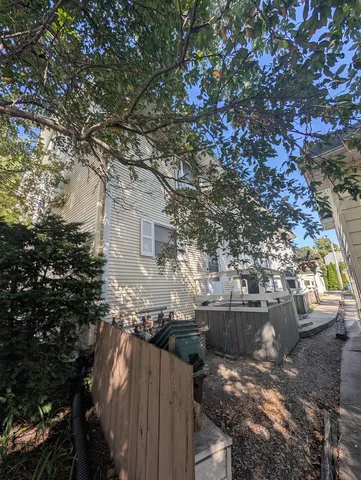 a view of a backyard of the house