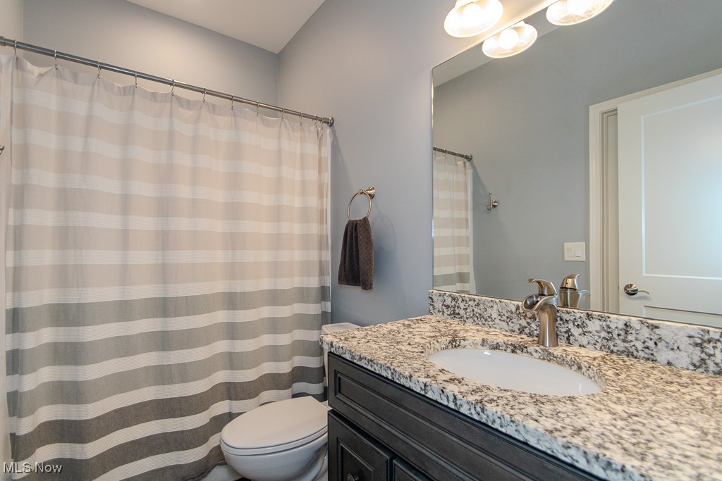 8675 Auburn Road Chardon, OH 44024 - Photo 29 of 35 Full bath featuring vanity and curtained shower