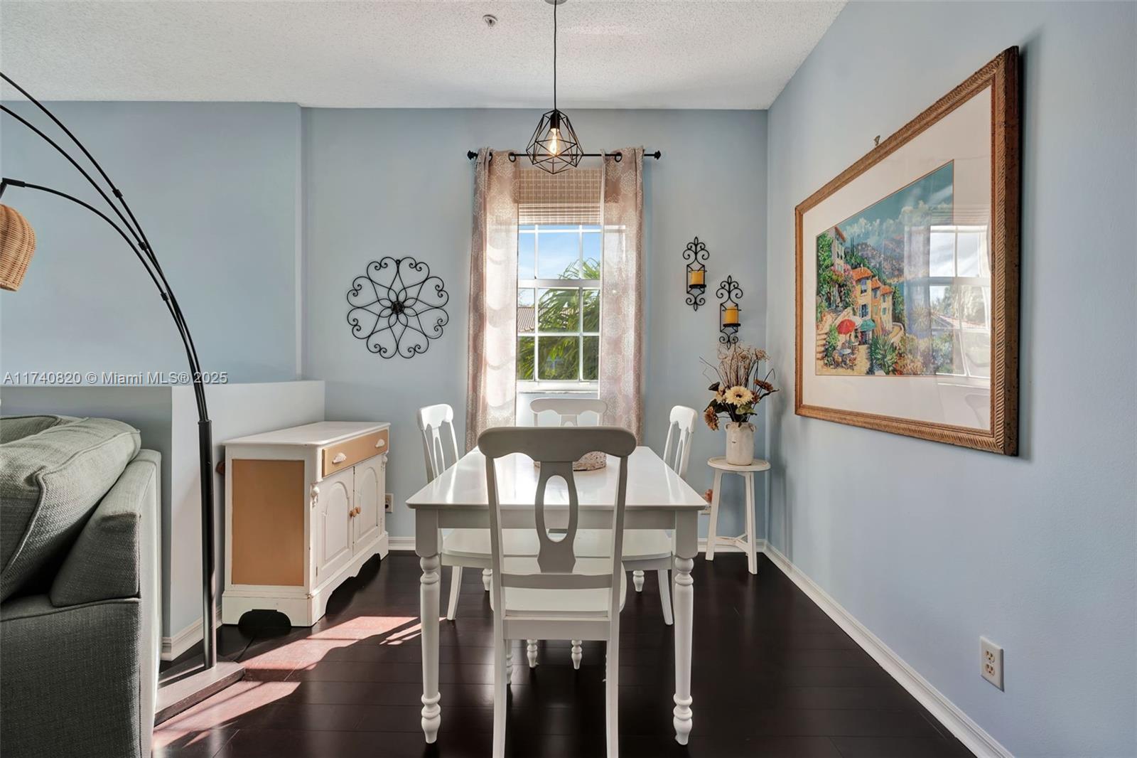 112 Lighthouse Circle, Unit H Tequesta, FL 33469 - Photo 11 of 39 a view of a dining room with furniture window and wooden floor