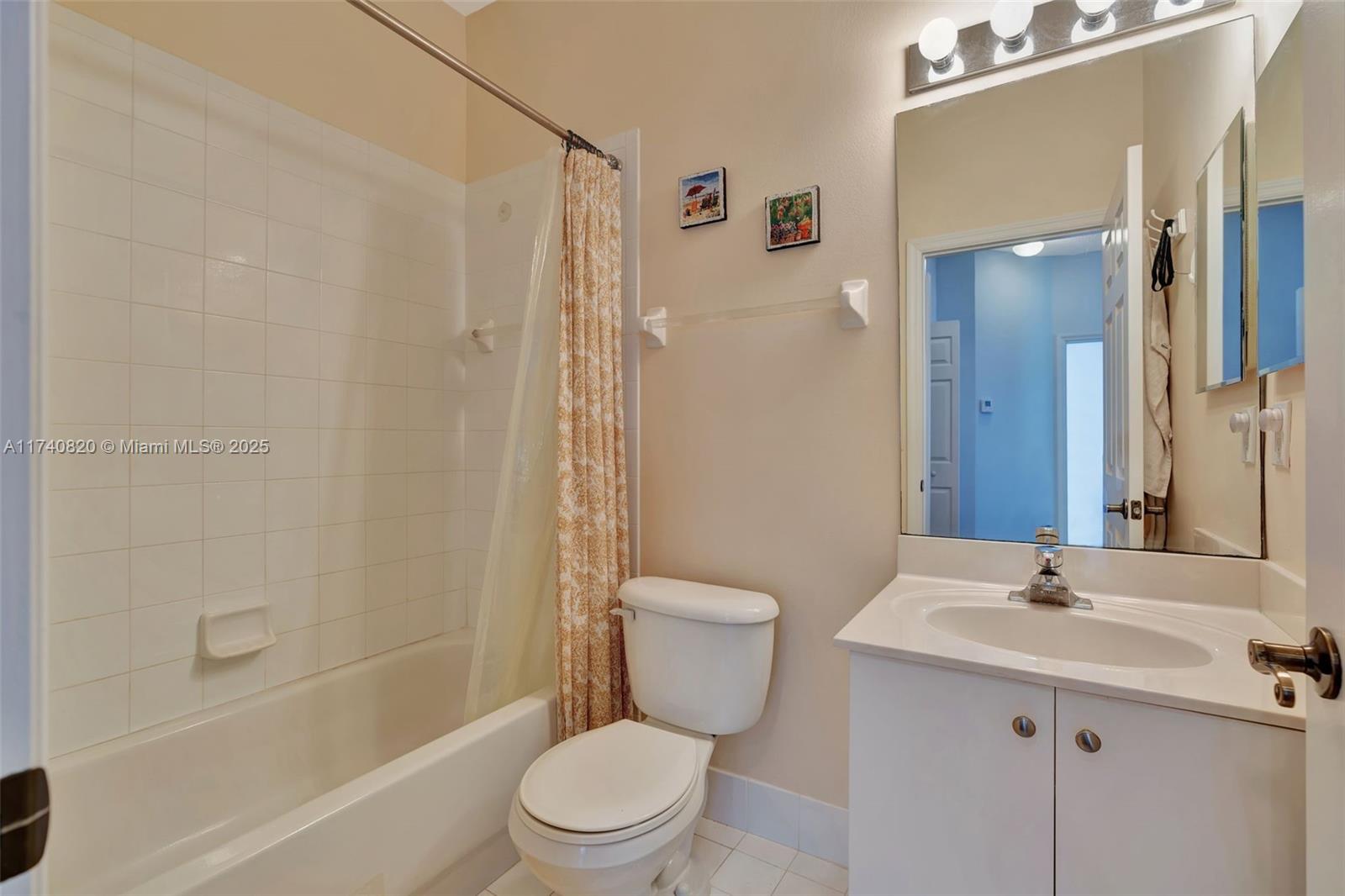 112 Lighthouse Circle, Unit H Tequesta, FL 33469 - Photo 21 of 39 a bathroom with a sink toilet and shower