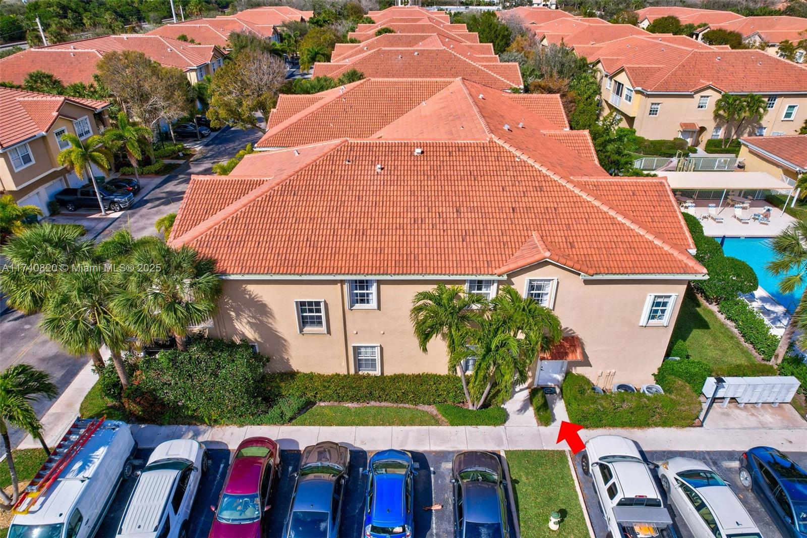 112 Lighthouse Circle, Unit H Tequesta, FL 33469 - Photo 25 of 39 an aerial view of multiple houses with yard