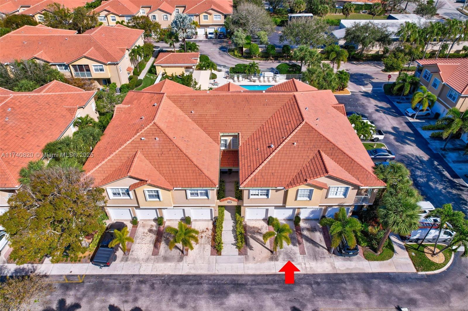 112 Lighthouse Circle, Unit H Tequesta, FL 33469 - Photo 27 of 39 an aerial view of residential houses and street