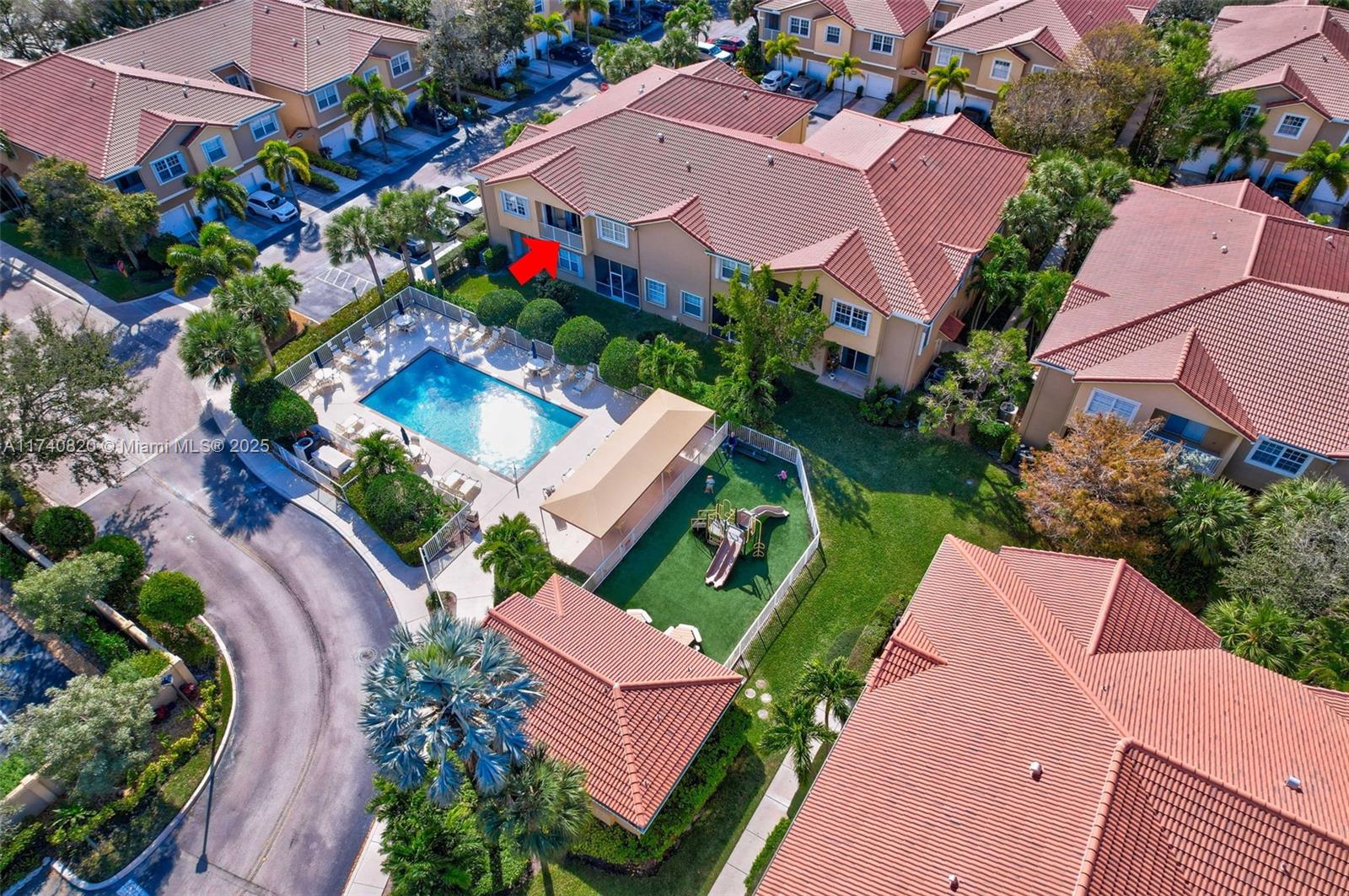 112 Lighthouse Circle, Unit H Tequesta, FL 33469 - Photo 30 of 39 an aerial view of multiple houses with yard