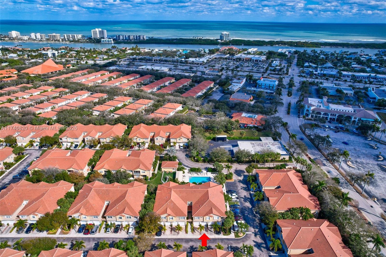 112 Lighthouse Circle, Unit H Tequesta, FL 33469 - Photo 33 of 39 an aerial view of residential houses with outdoor space