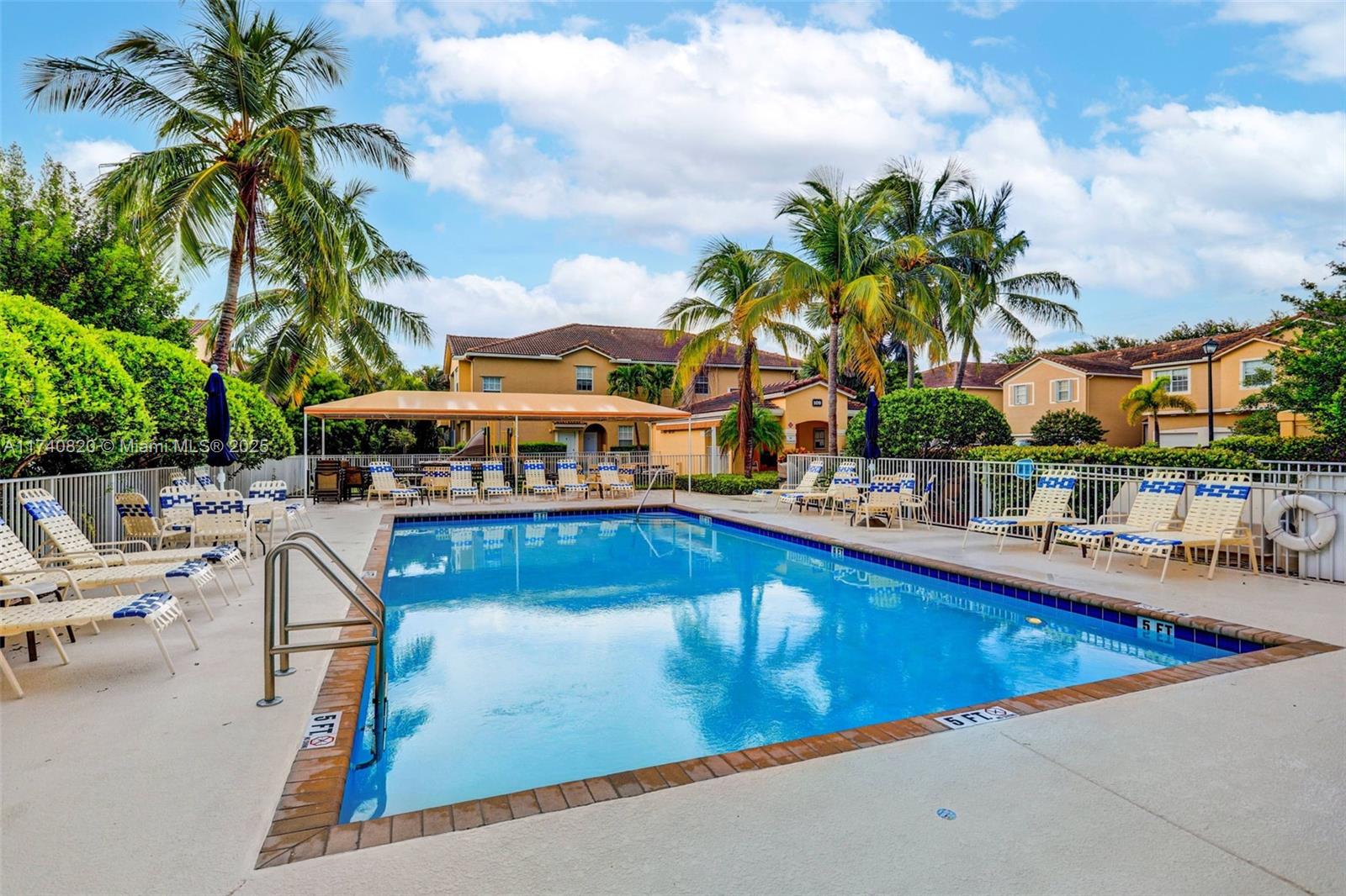 112 Lighthouse Circle, Unit H Tequesta, FL 33469 - Photo 38 of 39 a view of swimming pool with outdoor seating and city view