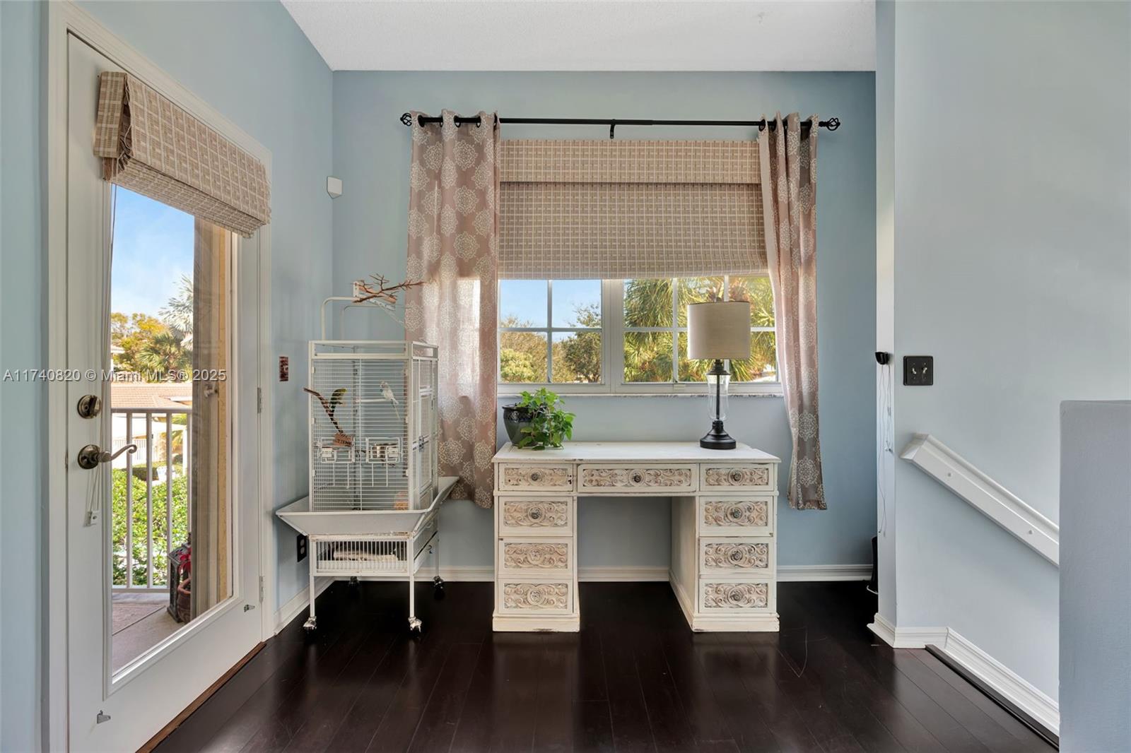 112 Lighthouse Circle, Unit H Tequesta, FL 33469 - Photo 9 of 39 a room with a wooden floor and a window