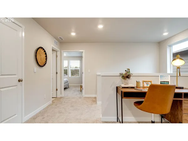 a open kitchen with a table and a chairs