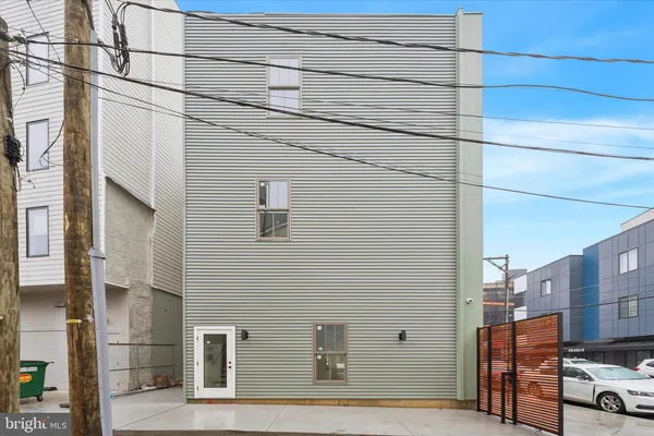 a view of a street with buildings
