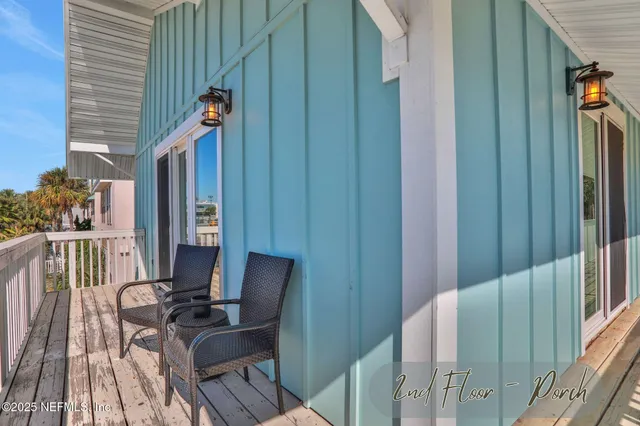 a bedroom with a bed and a lamp