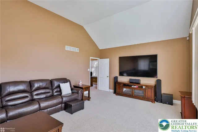 a bedroom with a bed and a closet