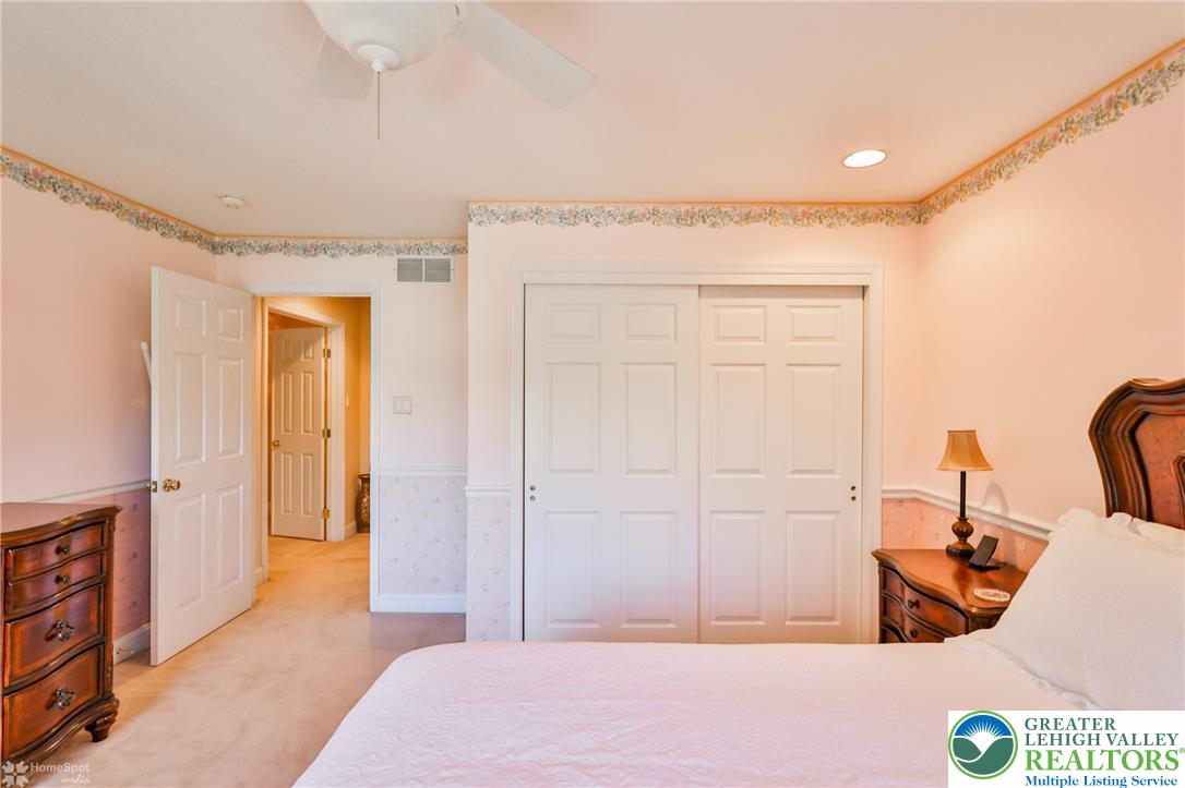 1991 Autumn Ridge Road Lower Macungie Township, PA 18062 - Photo 48 of 71 a bedroom with a bed and a closet