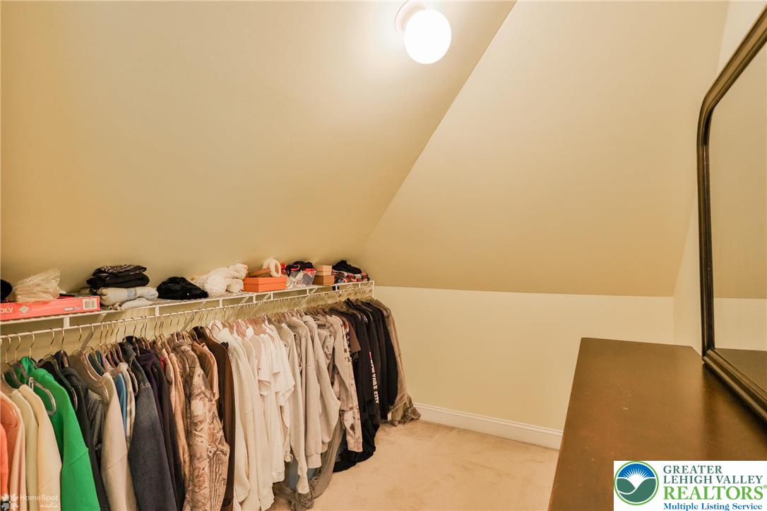 1991 Autumn Ridge Road Lower Macungie Township, PA 18062 - Photo 65 of 71 a view of walk in closet with clothes and shoes