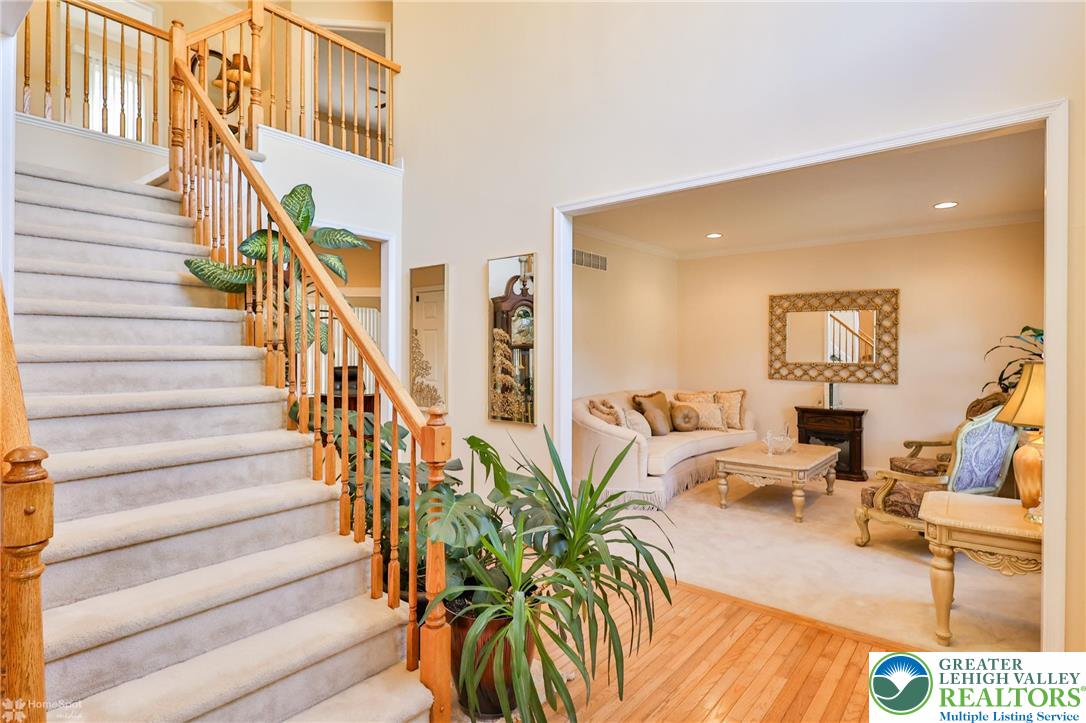 1991 Autumn Ridge Road Lower Macungie Township, PA 18062 - Photo 8 of 71 a view of entryway and hall with wooden floor