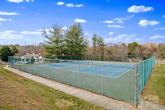 a wooden bench sitting on top of a wooden floor