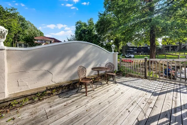 a view of backyard with sitting area