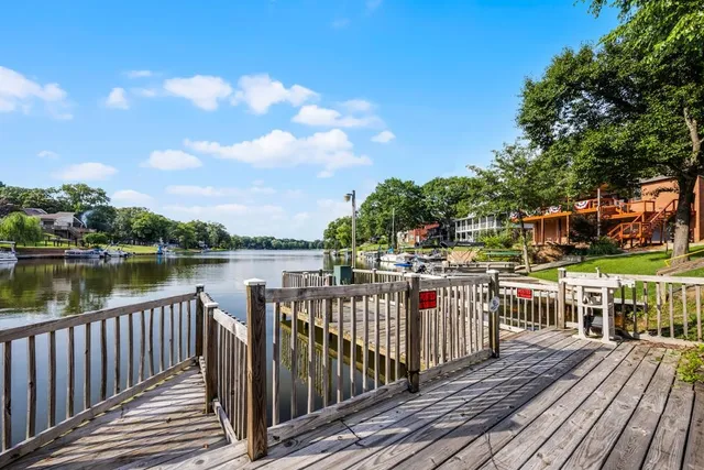 a view of roof deck with patio
