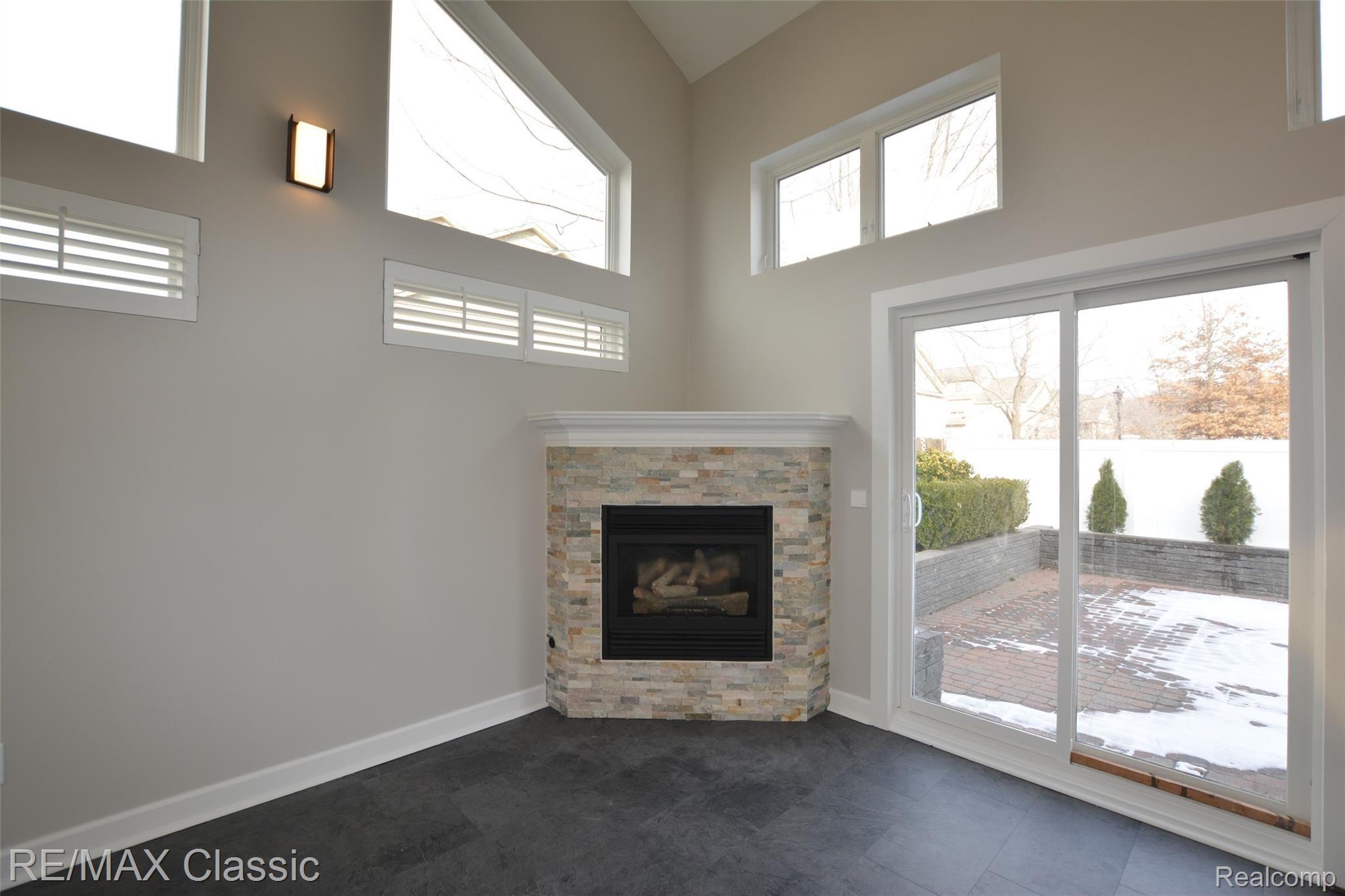 321 Leon Road Walled Lake, MI 48390 - Photo 20 of 53 Rec Room w/Gas Fireplace