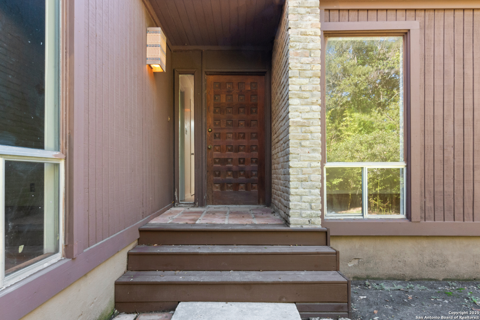 a view of staircase with large window