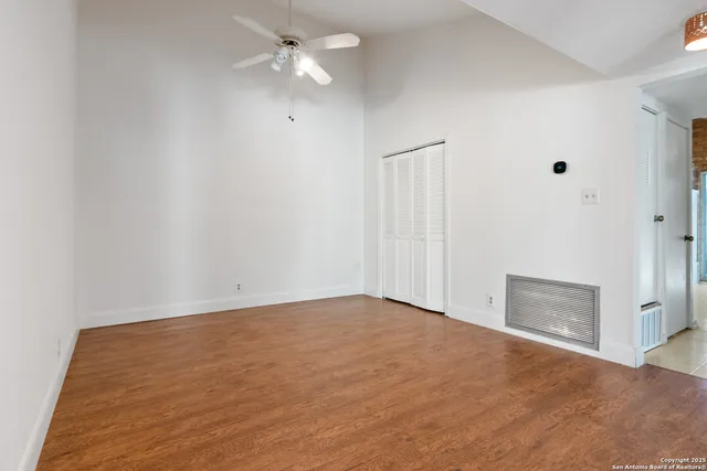 an empty room with a bathroom