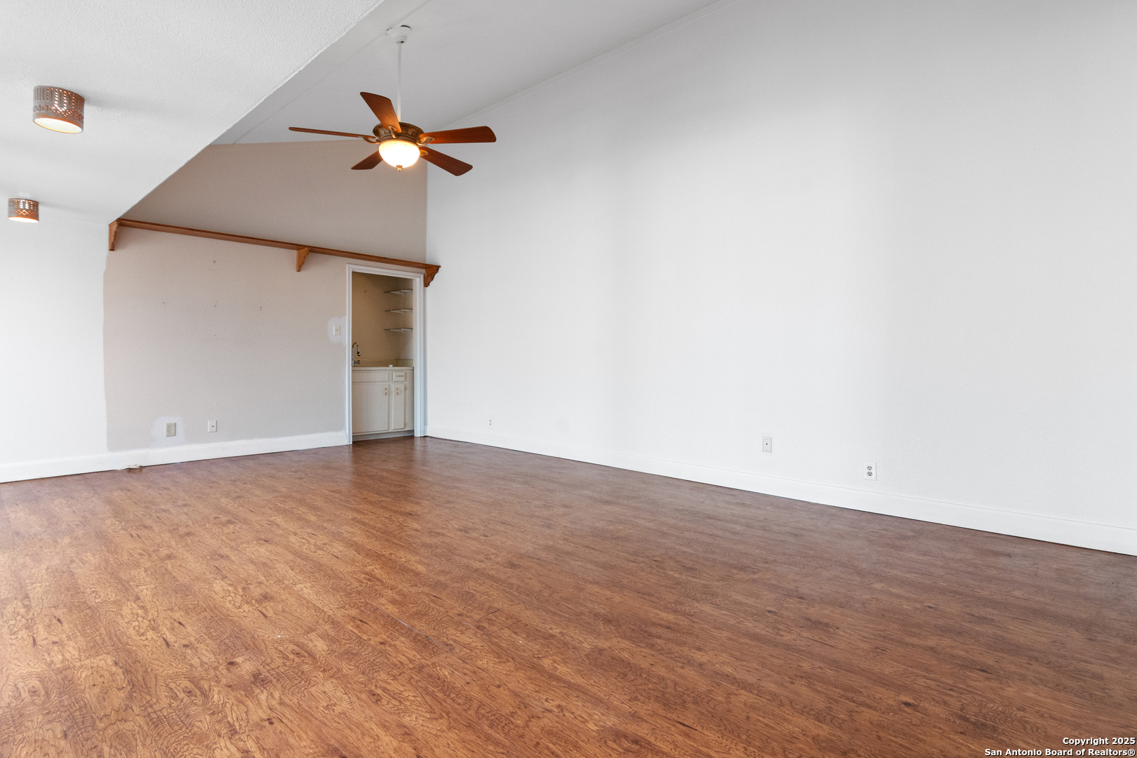 12031 Arms Way Street Live Oak, TX 78233 - Photo 4 of 24 a view of a room with a ceiling fan