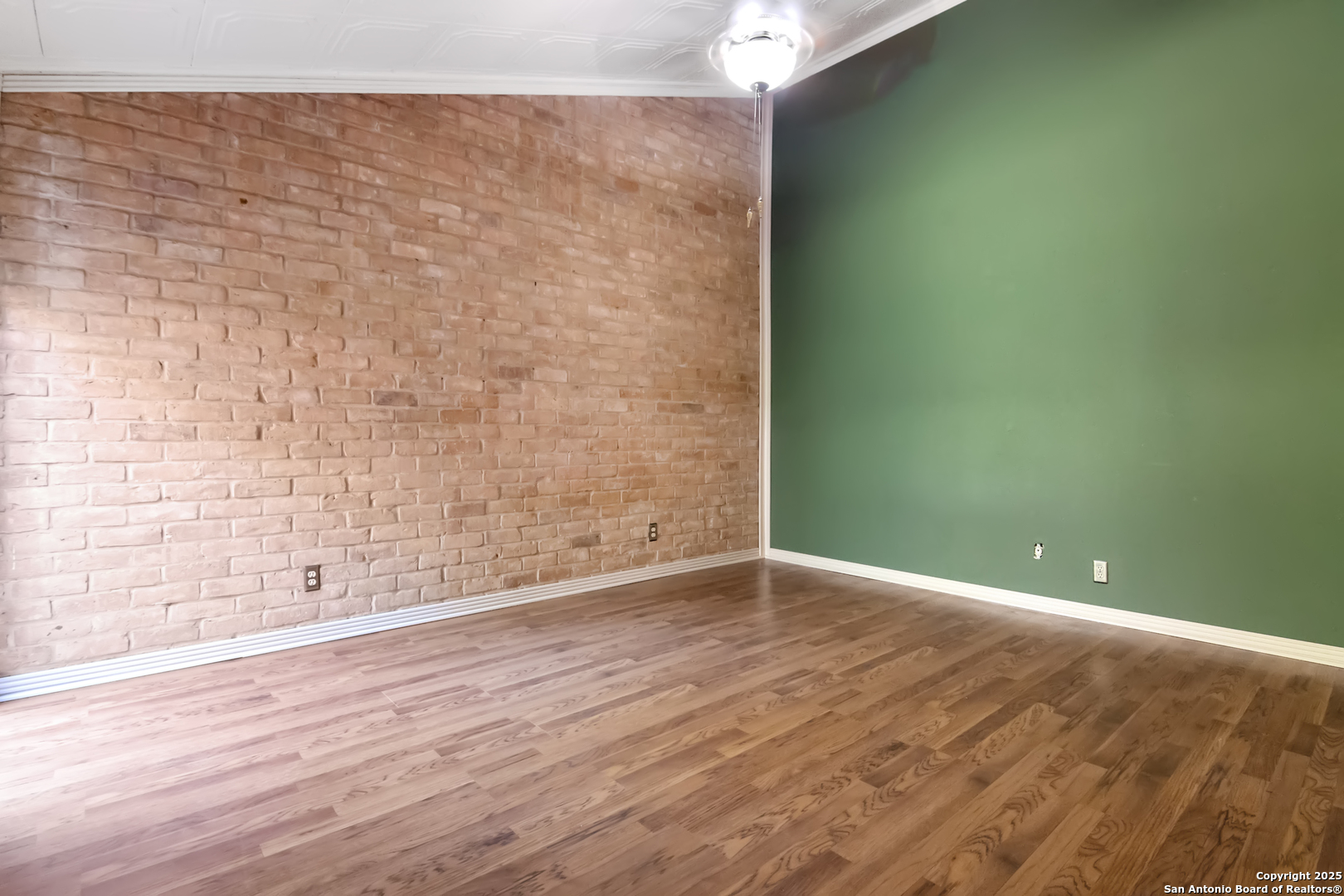 12031 Arms Way Street Live Oak, TX 78233 - Photo 5 of 24 a view of empty room with wooden floor