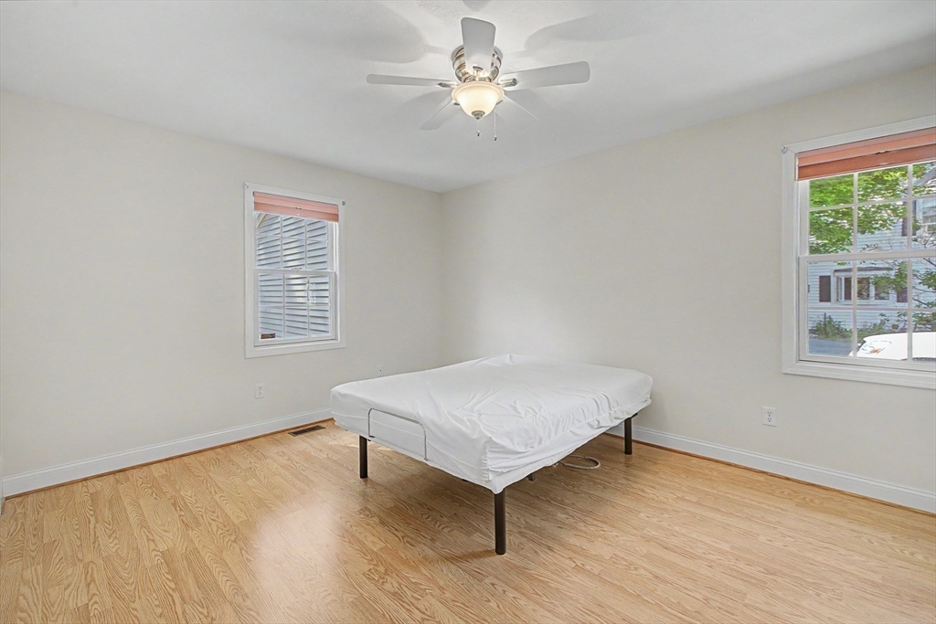 792 Ryan Road Northampton, MA 01062 - Photo 13 of 29 a room with wooden floor and a window
