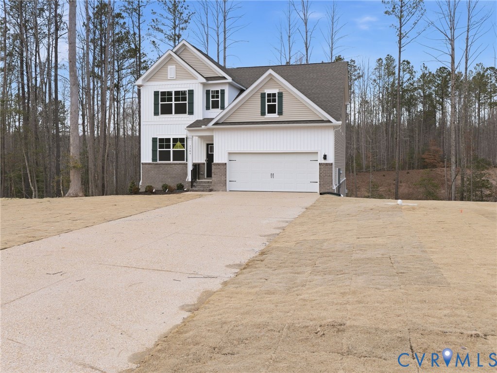 7784 Patriots Way Gloucester, VA 23061 - Photo 2 of 32 a house with a outdoor space