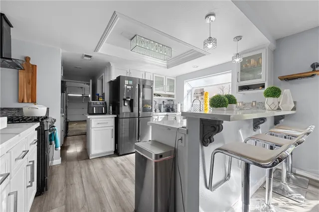 a kitchen with a stove and a sink