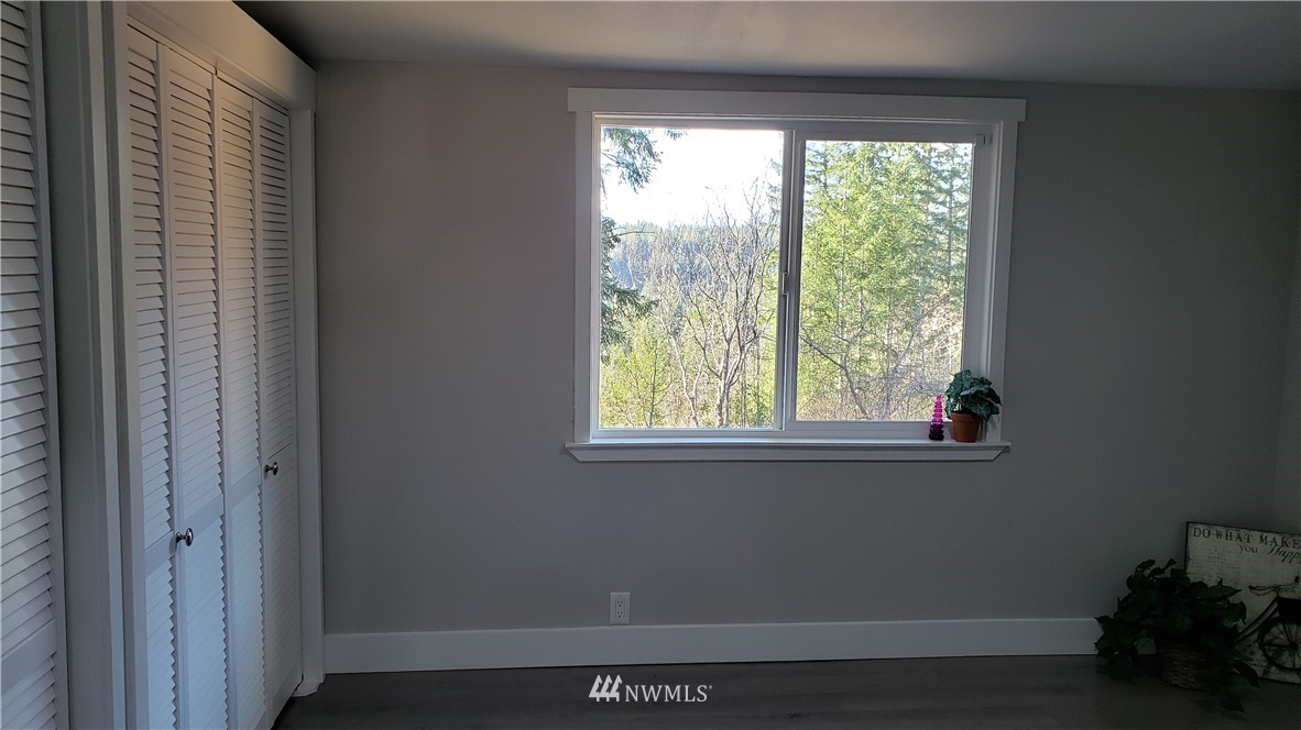 1040 Northeast Larson Boulevard Belfair, WA 98528 - Photo 11 of 31 a view of a room that has a window in it