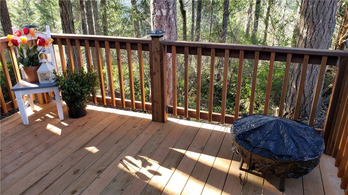 1040 Northeast Larson Boulevard Belfair, WA 98528 - Photo 24 of 31 a view of balcony with wooden floor