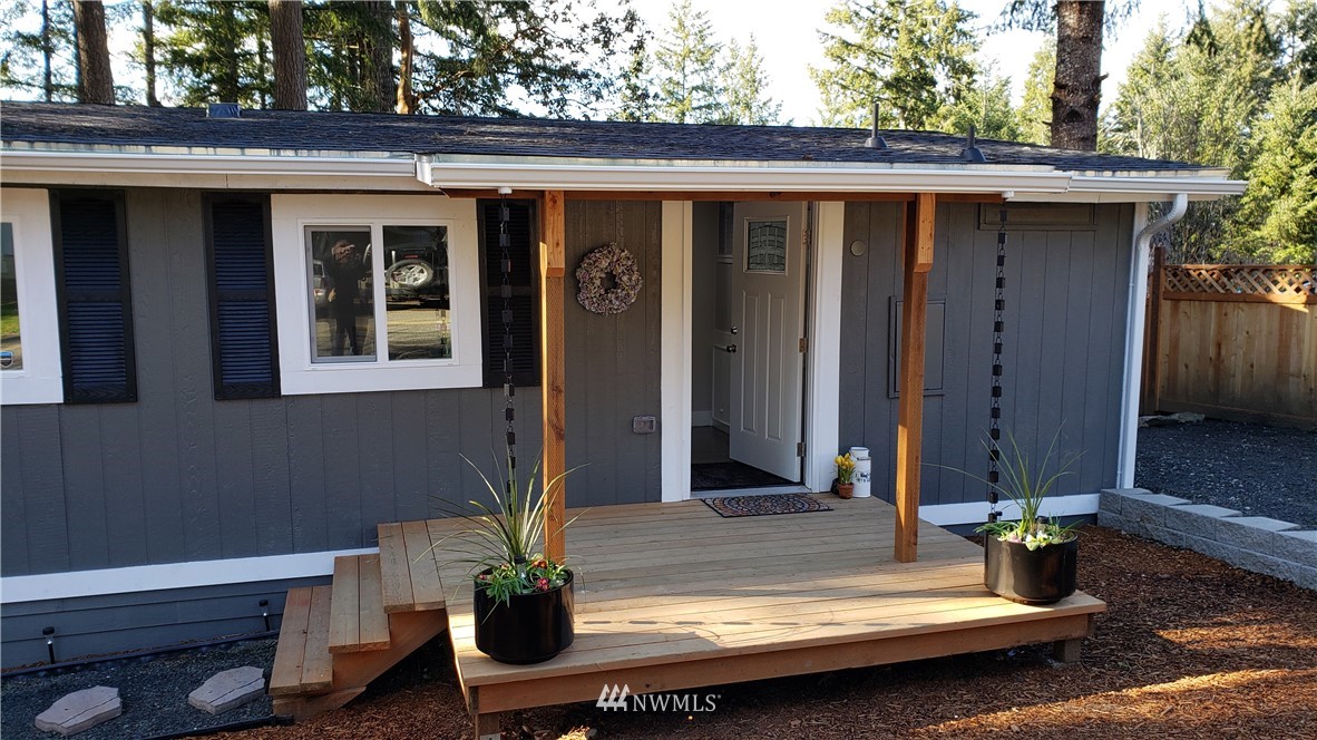 1040 Northeast Larson Boulevard Belfair, WA 98528 - Photo 31 of 31 a view of backyard with cabin