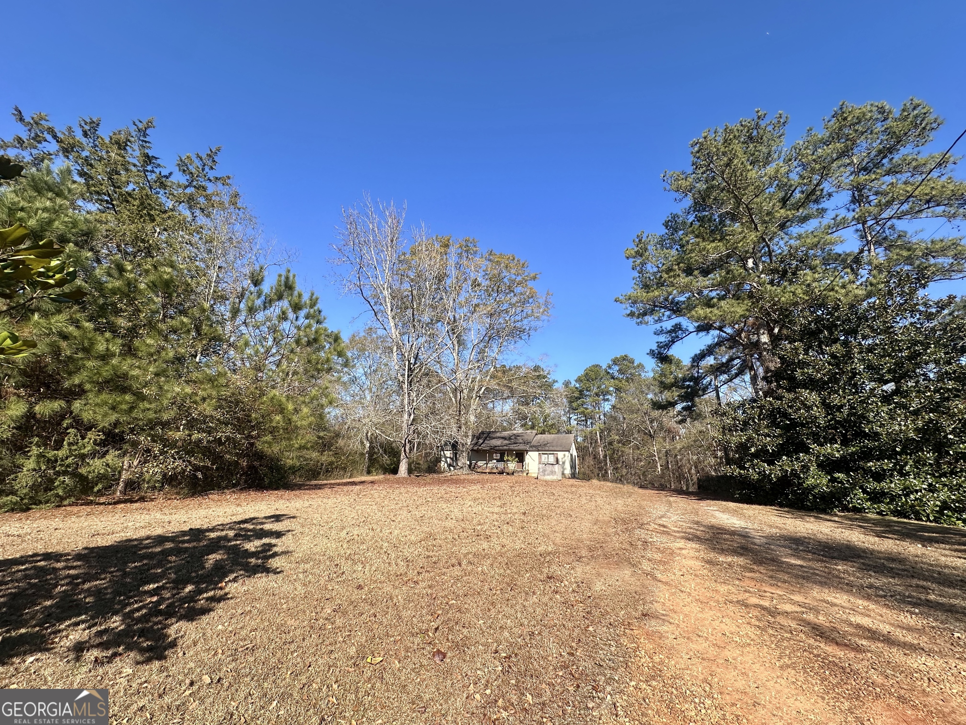 276 Oglesby Bridge Road Southeast Conyers, GA 30094 - Photo 16 of 49 a view of road view with large trees