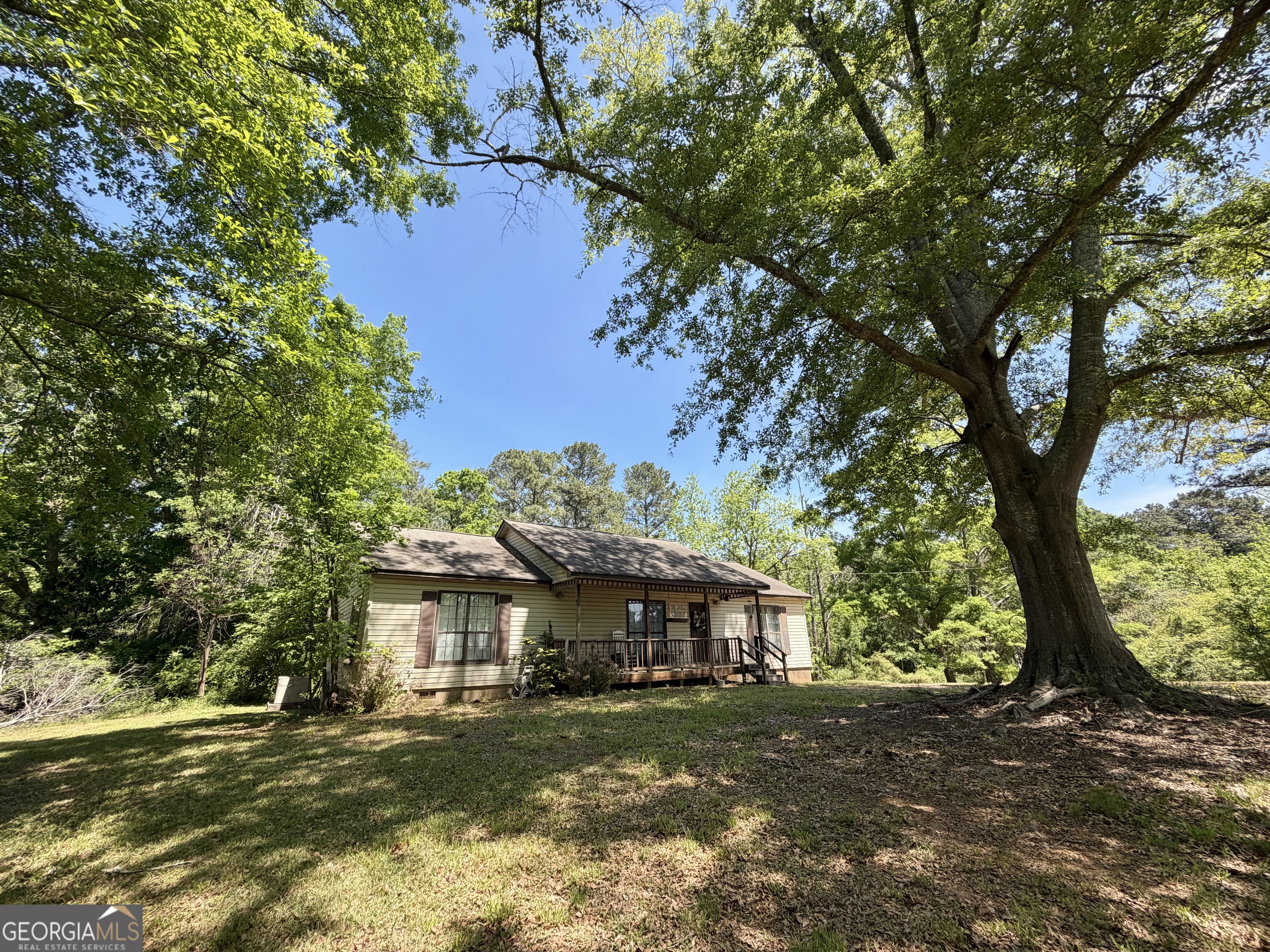 276 Oglesby Bridge Road Southeast Conyers, GA 30094 - Photo 2 of 49 a view of a house with a yard