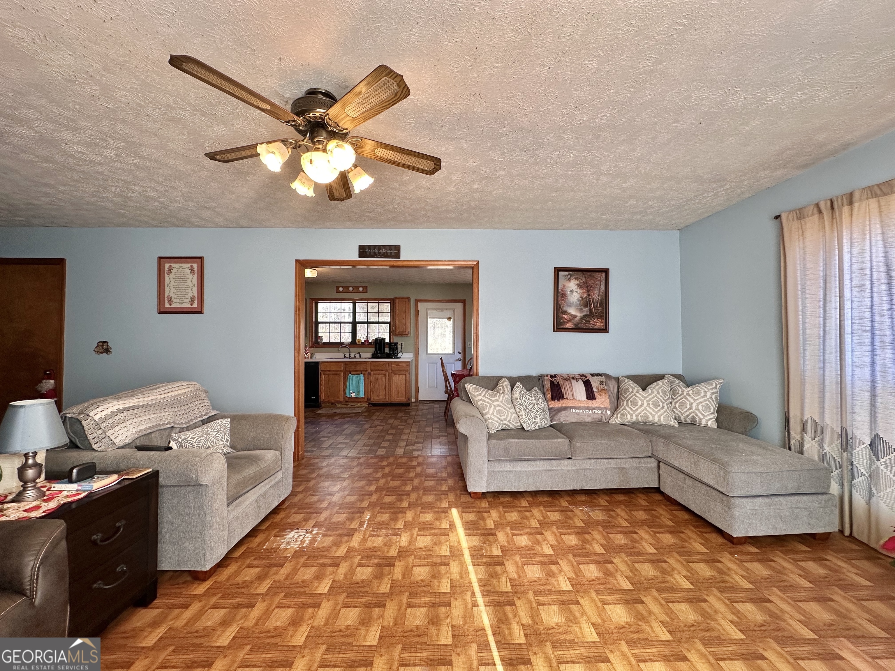 276 Oglesby Bridge Road Southeast Conyers, GA 30094 - Photo 29 of 49 a living room with furniture and a window